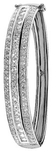 Silver bangle High polish Sterling Silver Clear zirconium Three rows of jewels hinged, 25 grams.