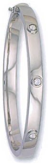 Gold bangle High polish 9ct white gold Clear zirconium 5mm rectangle oval hollow, 10.5 grams.