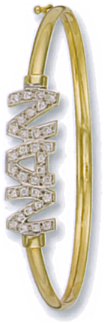 Gold bangle High polish 9ct gold Clear zirconium Oval NAN inset jewels, 5.9 grams.